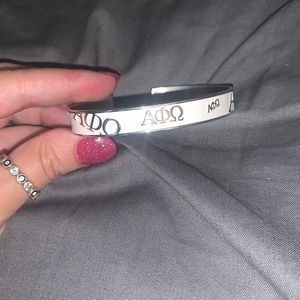 Alpha Phi Omega white bracelet